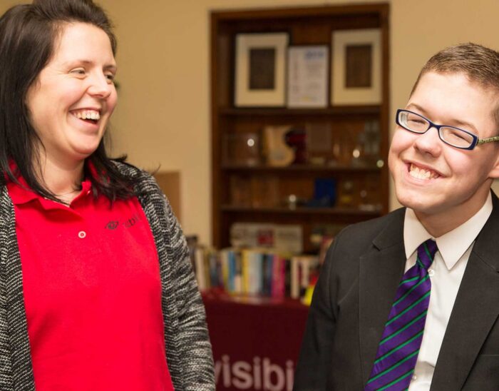 Photo of Aoife and one of our teenagers smiling from the Children &amp; Families Project