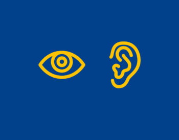 Yellow eye and yellow ear on blue background