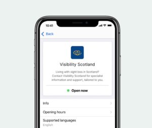 An iPhone with the screen showing Visibility Scotland's page on the Be My Eyes app