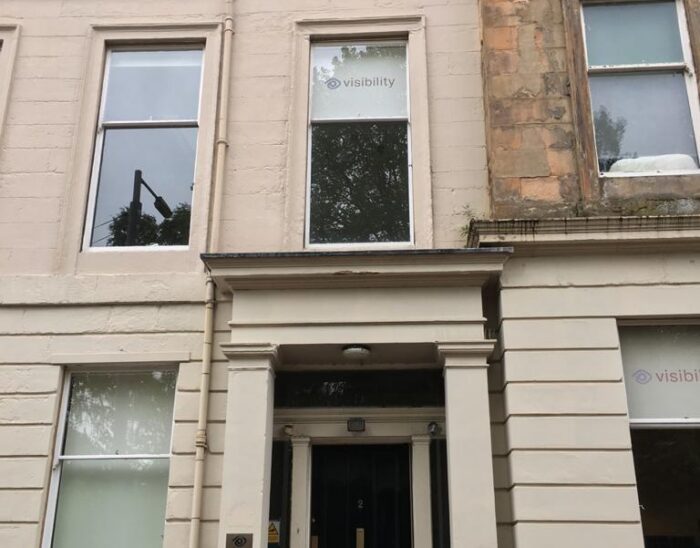 The main entrance of 2 Queen's Crescent, Visibility Scotland's office in Glasgow