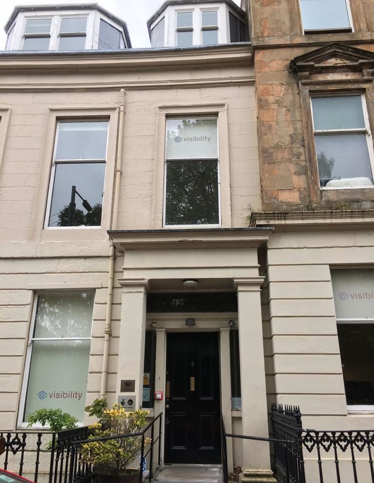 The main entrance of 2 Queen's Crescent, Visibility Scotland's office in Glasgow