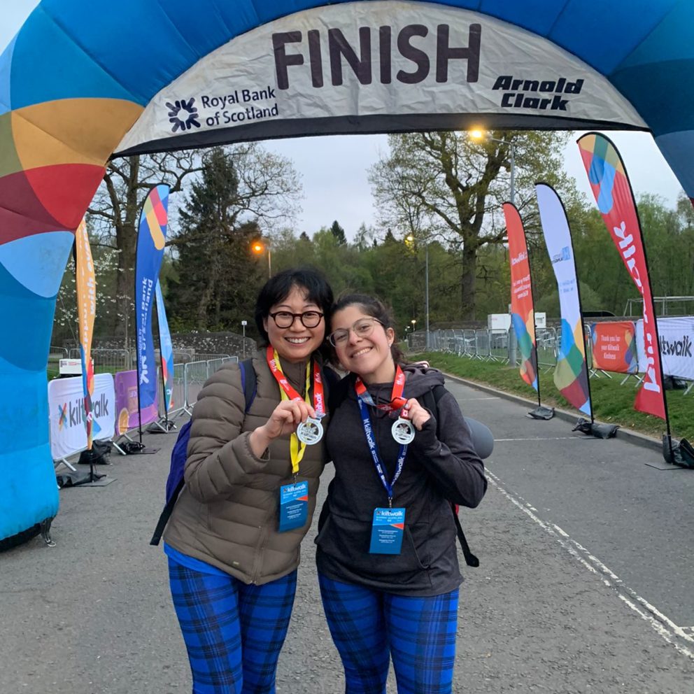 Visibility Scotland volunteer, Zee, and her friend at the finish line of the 2022 Glasgow Kiltwalk.