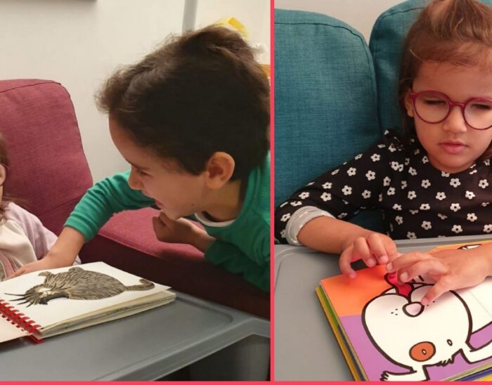4 year-old Aurora reading using a tactile book