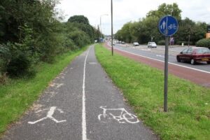 A picture of the outdoors showing a shared pedestrian and cycle route