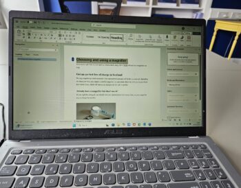 A windows laptop with a Word document on screen
